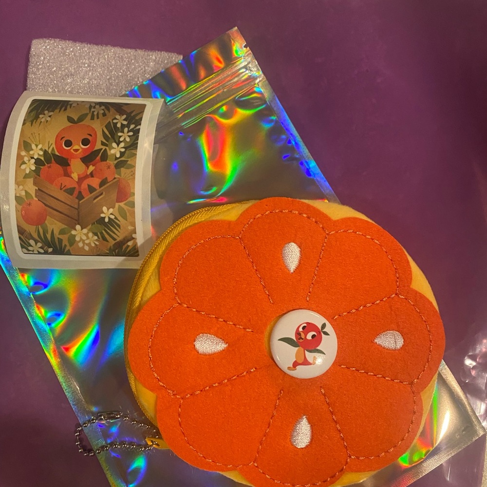 ORANGE BIRD COIN PURSE EARBUD HOLDER NEW !!